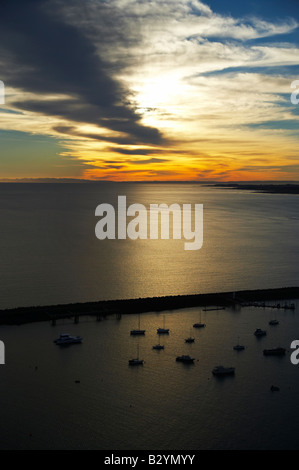 Sunrise over Marina Lee Breakwater and North Taranaki Bight Port Taranaki New Plymouth Taranaki North Island New Zealand aerial Stock Photo