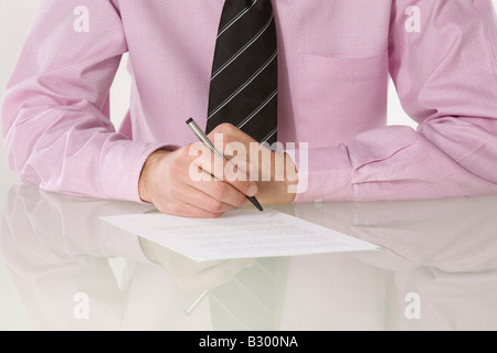 Close-up of Businessman Writing Stock Photo