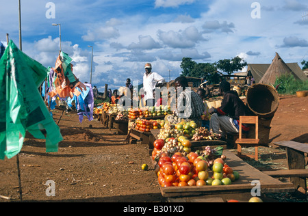 Roadside stall holders selling fresh fruit and vegetables on market stalls, Malawi, Africa Stock Photo