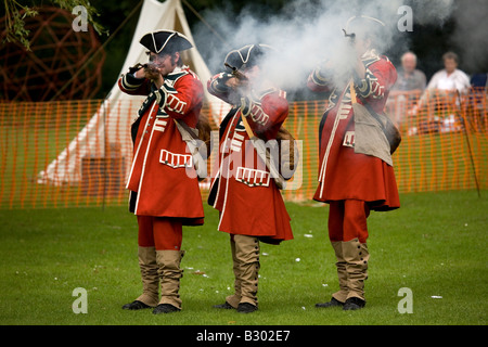 Members of the 68th Durham Light Infantry Display Team wear replica uniforms of the Napoleonic War era. Stock Photo