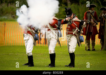 Members of the 68th Durham Light Infantry Display Team wear replica uniforms of the Napoleonic War era. Stock Photo