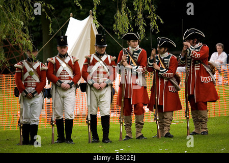 Members of the 68th Durham Light Infantry Display Team wear replica uniforms of the Napoleonic War era and mid eighteeth century Stock Photo