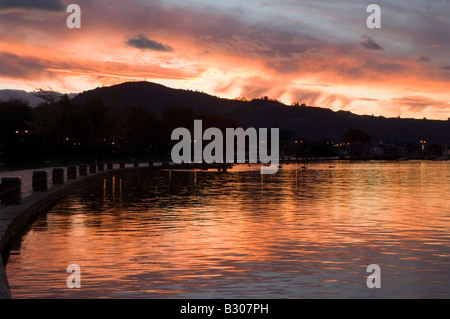 Flaming sunset over Lake Rotorua, New Zealand Stock Photo