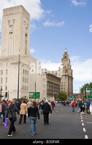 Liverpool Merseyside England UK View along The Strand road traffic-free and busy with pedestrians Stock Photo