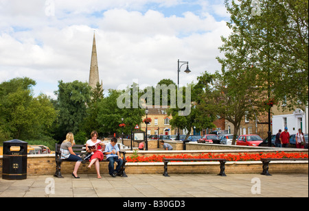 Members of the public enjoying the morning sun in the newly designed seating area along the Waits. Stock Photo