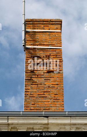 Decorative letters 'PL' reinforcing chimney stack, France. Stock Photo