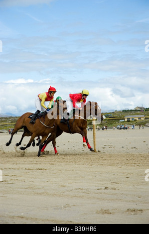 Pony racing on the beach, Omey Races, near Clifden, Connemara, County Galway, Ireland Stock Photo