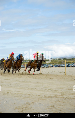 Pony racing on the beach, Omey Races, near Clifden, Connemara, County Galway, Ireland Stock Photo