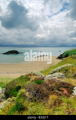 Porth Y Clochydd on Llanddwyn Island off the coast of Anglesey at Newborough Warren Stock Photo