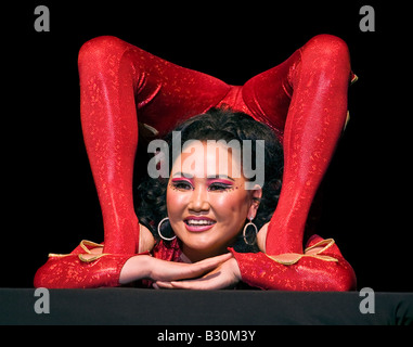 Female contortionist performing Stock Photo - Alamy