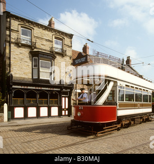 UK England County Durham Beamish Open Air Museum tram waiting outside Sun Inn Stock Photo