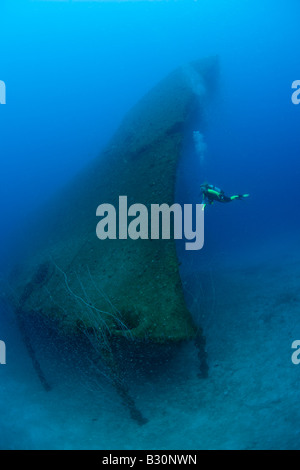 Diver at Bow of USS Arkansas Battleship Marshall Islands Bikini Atoll Micronesia Pacific Ocean Stock Photo