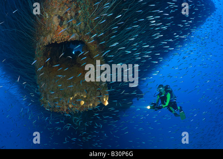 Diver at Anchor Hawse Hole at Bow of USS Saratoga Marshall Islands Bikini Atoll Micronesia Pacific Ocean Stock Photo