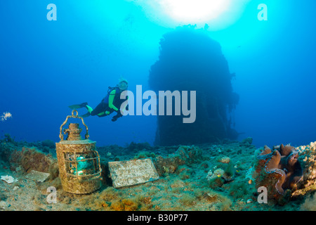 Diver finds Artifacts on Flight Deck of USS Saratoga Marshall Islands Bikini Atoll Micronesia Pacific Ocean Stock Photo