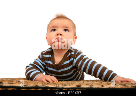 portrait of a baby lying on a blanket Stock Photo