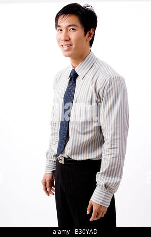 A young asia businessman in striped shirt Stock Photo