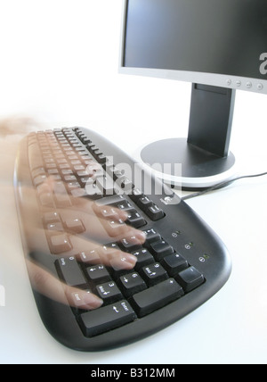 hands on a key pad Stock Photo
