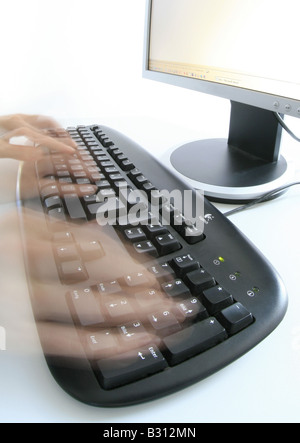 hands on a key pad Stock Photo