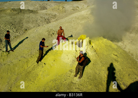 People about crater fumarole, volcano Mendeleev, Kunashir island, Kurils islands, Far East of Russia Stock Photo