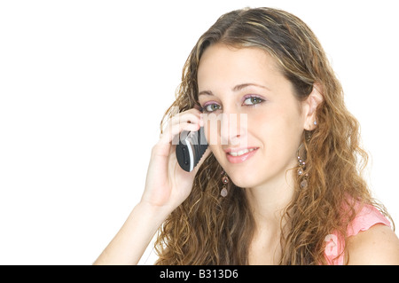 A pretty young teenager talks on the phone Stock Photo