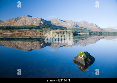 Reflection of the Twelve Bens Mountains in Lough Inagh, Connemara, County Galway, Ireland. Stock Photo