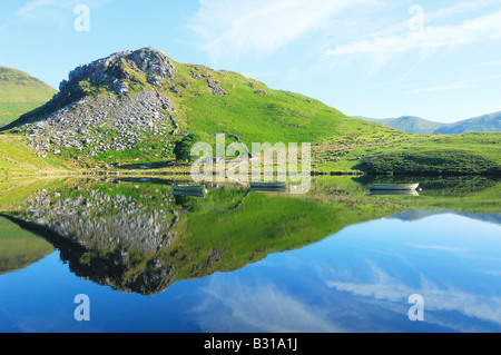 A beautifully calm morning at Llyn Dywarchen in Snowdonia national park North Wales Stock Photo