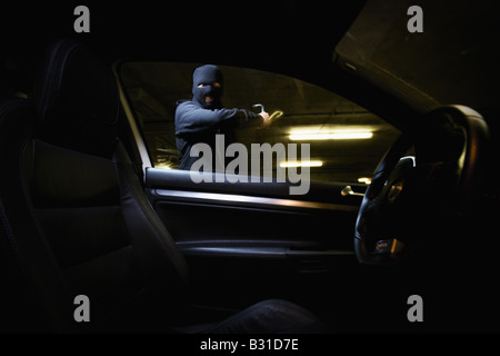 Interior view of thief breaking in car Stock Photo