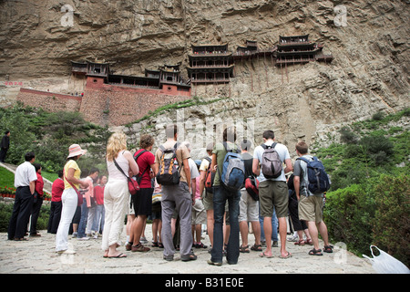 Tourists at the hanging monastery located in the Jinlong Canyon, Shanxi Province, China. Stock Photo