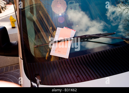 A parking ticket on a Mini-van windscreen Stock Photo