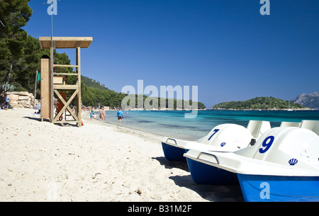 Lifeguards lookout tower on a Mallorcan Beach - Formentor, with Pedalos in the foreground. Stock Photo