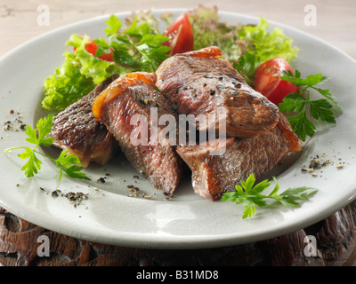 sirloin beef steak and fresh mixed salad Stock Photo