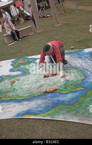 Display of British history as re-enactment of events leading to Battle of Hastings are demonstrated on large map of Britain Stock Photo