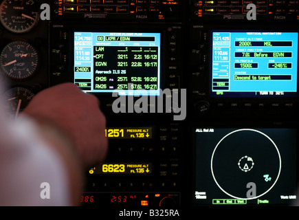 Pilots use their instruments in the cockpit of a small prop plane Stock ...