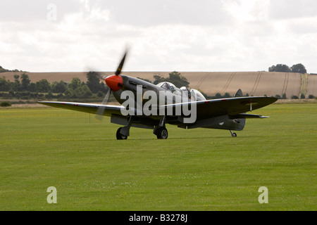 A Supermarine Spitfire ML407 two seat training craft based at the Imperial War Museum Duxford in Cambridgeshire Stock Photo