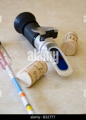 Home wine making with a hydrometer and a refractometer Stock Photo