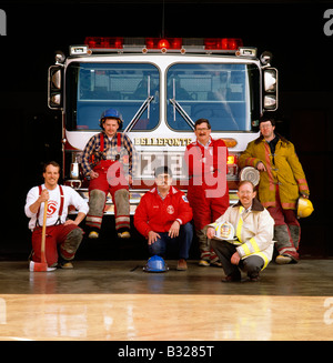 BELLEFONTE, PA, VOLUNTEER FIRE DEPARTMENT MEMBERS POSE IN FRONT OF A FIRE TRUCK Stock Photo