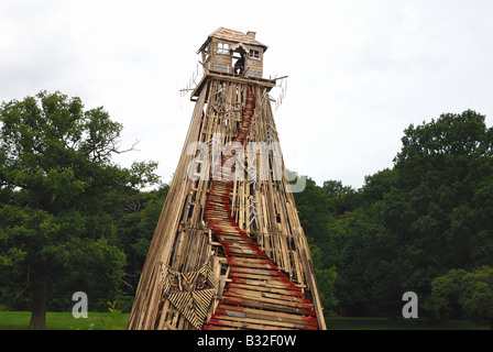 Wooden sculpture of house on Colum Big Chill Festival Stock Photo