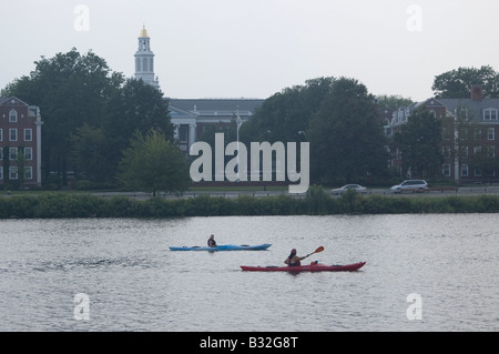 Kayaking on the River Charles with Harvard Business School in the background Stock Photo