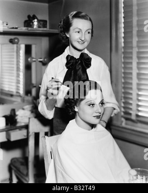 Young woman getting her hair done in a hair salon Stock Photo
