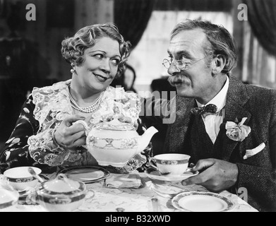 Couple sitting together having tea Stock Photo
