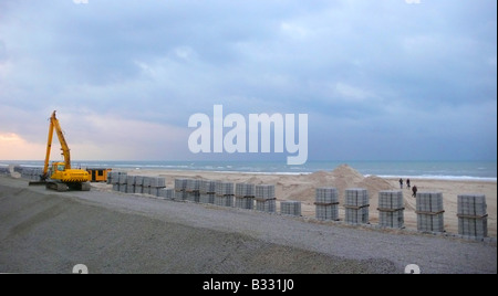 dike construction for amplifying the coast Stock Photo