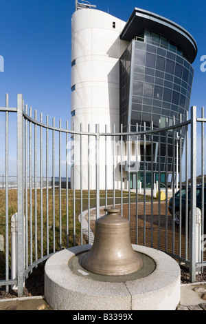 The old fog warning bell in front of the Marine Operations Centre (opened in 2006) at Aberdeen Harbour, Aberdeenshire, Scotland Stock Photo