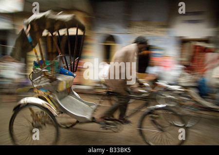 Varanasi Rickshaws Rickshaw under the rain at Varanasi, India Stock Photo - Alamy