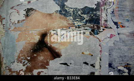 Abstract expressionist effect of peeled and torn layers of  temporary subway posters tempus fugit Stock Photo
