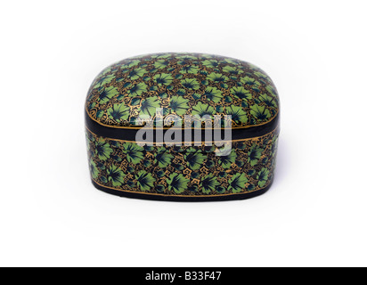 Green patterned papier mache box, white background Stock Photo