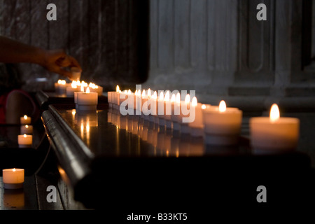 Votive candles in the church of Sant'Agnese in Agone, Piazza Navona, Rome, Italy Stock Photo
