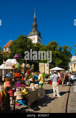 Market stalls selling hats and other accessories in front of Niguliste Church in old town Tallinn Estonia Europe Stock Photo