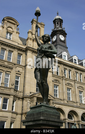 City of Leeds, England. One of the eight Alfred Drury sculpted statues of the lady lampholder in Leeds City Square. Stock Photo