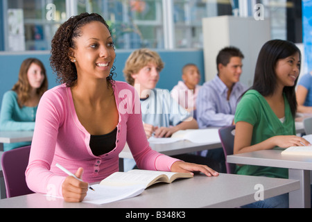 Students studying in geography class Stock Photo