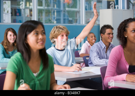 Students answering questions in geography class Stock Photo